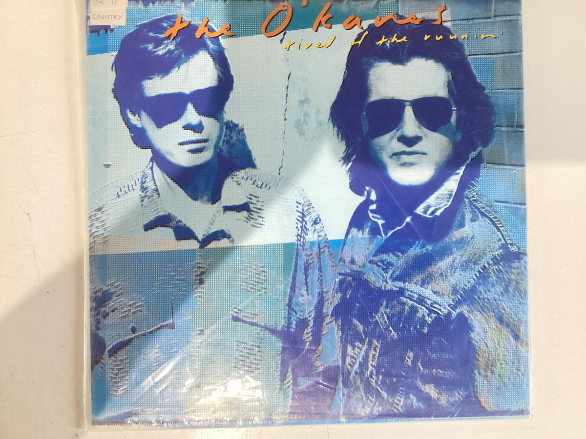 THE O’KANES = TIRED OF THE RUNNIN’ (CDA 1988) (USED)