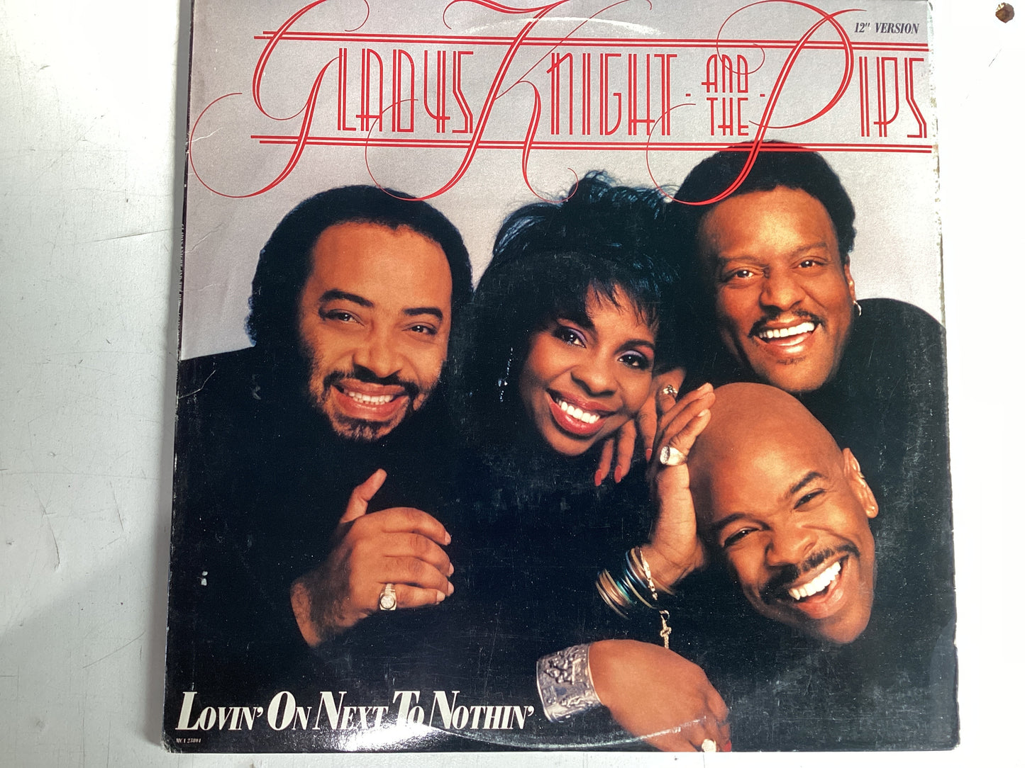 KNIGHT, GLADYS AND THE PIPS = IN THE BEGINNING (CDA 1974) (USED)= LOVIN’ ON NEXT TO NOTHIN’ (USA 1988) (USED)