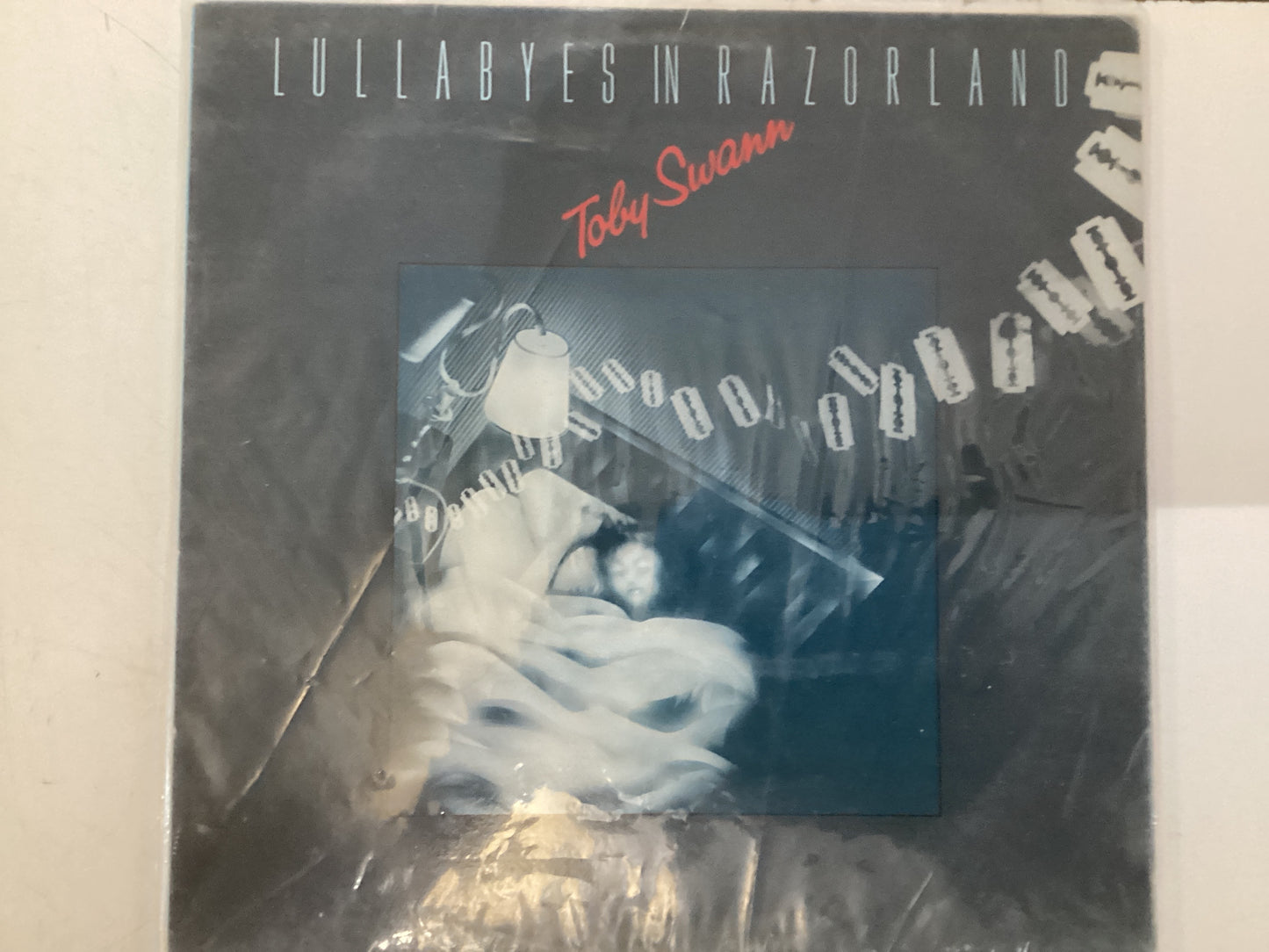 SWAN, TOBY = LULLABYES IN RAZORLAND (CDA 1980) (USED)