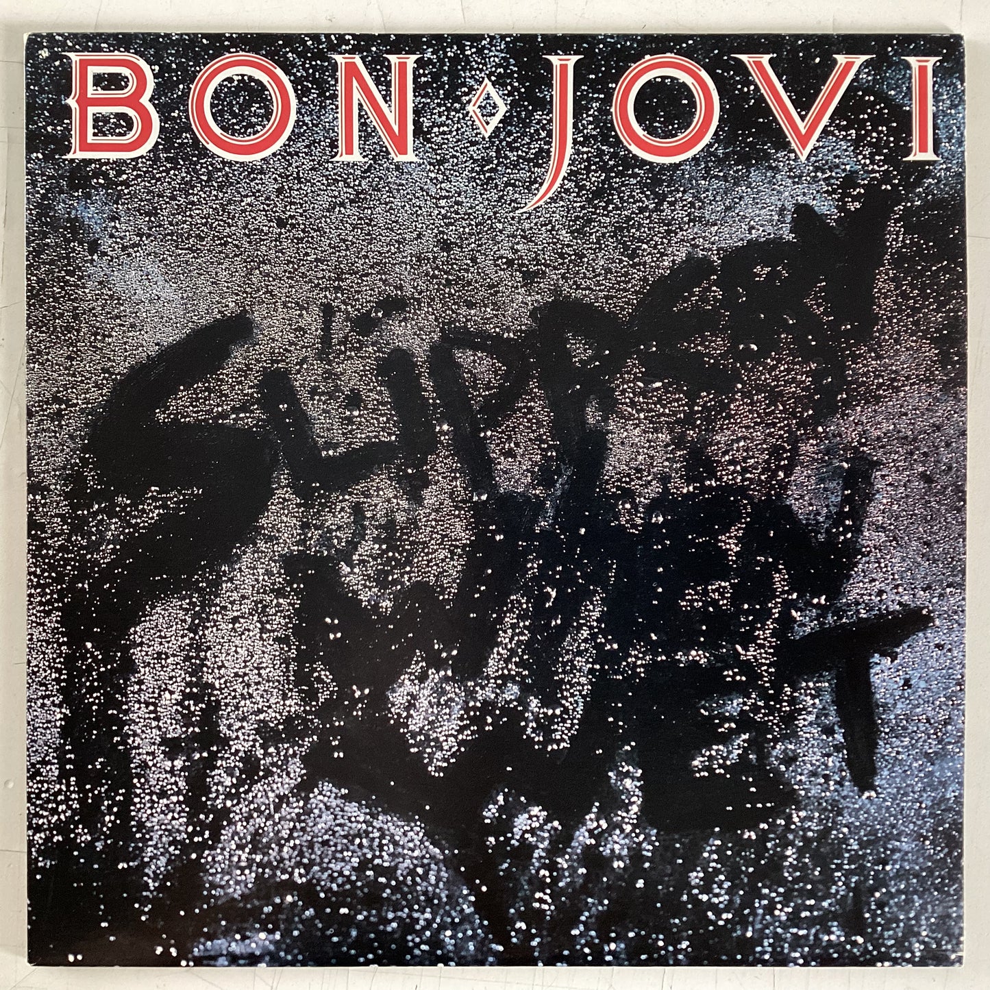 BON JOVI = SLIPPERY WHEN WET (CDN 1986) (USED)