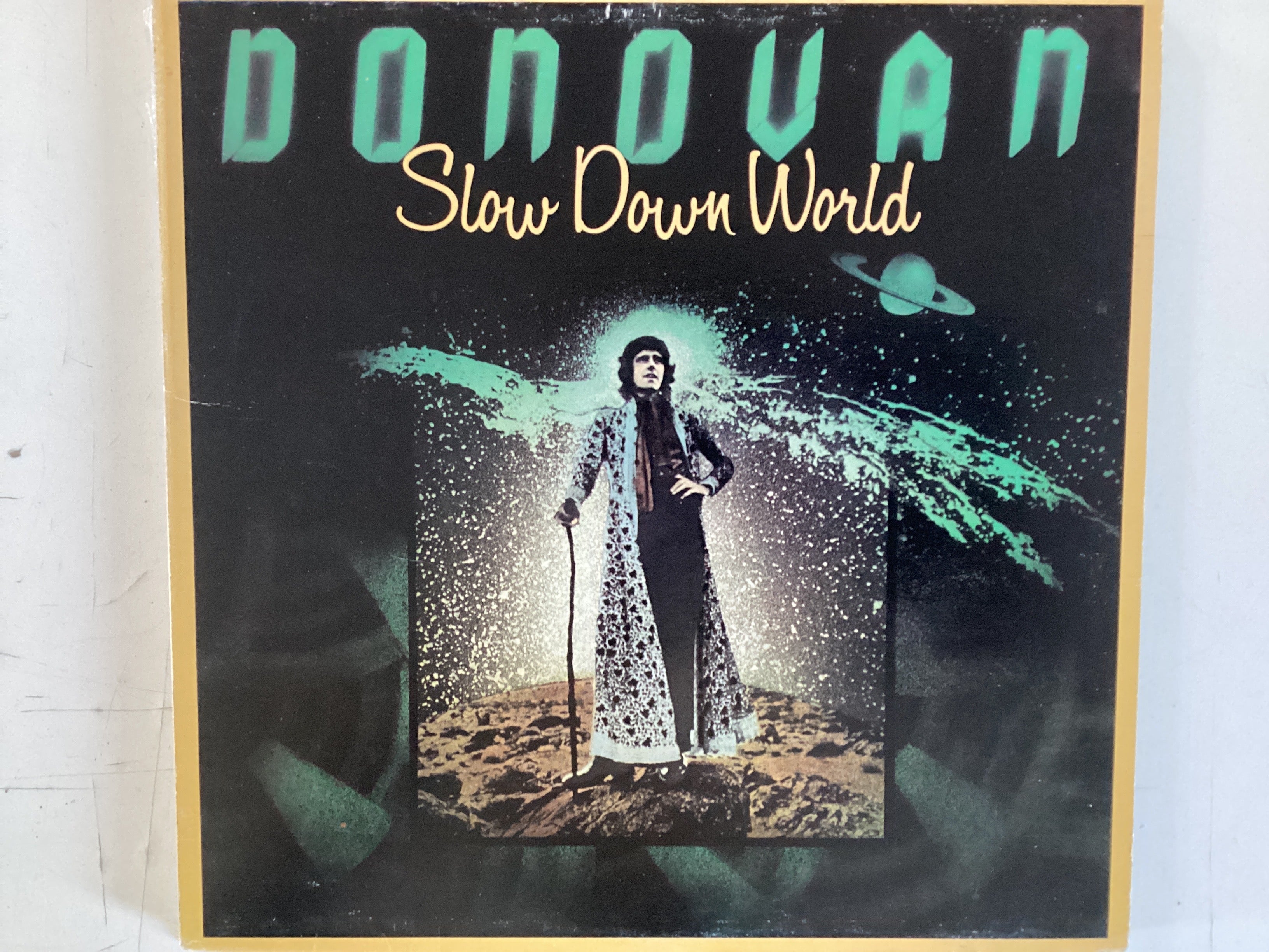 DONOVAN = SLOW DOWN WORLD (CDA 1976) (USED)