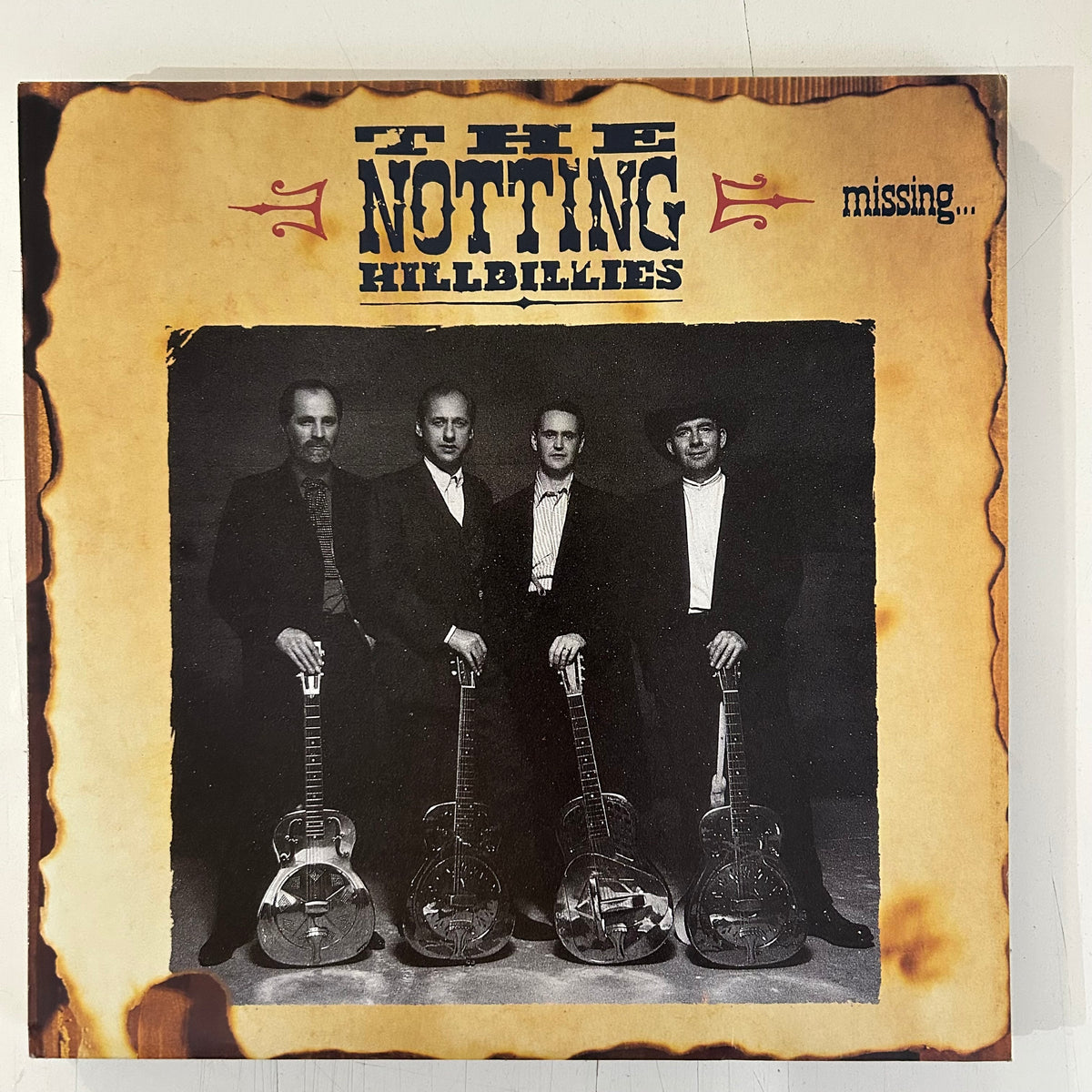 NOTTING HILLBILLIES (DIRE STRAITS) = MISSING… PRESUMED HAVING A GOOD TIME (CDN 1990) (USED)
